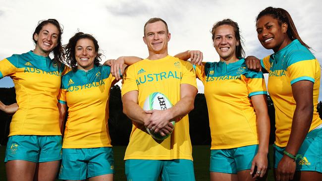 Coach Tim Walsh with players (l-r) Alicia Quirk, Emilee Cherry, Evania Pelite and Ellia Green ahead of the 2014 Rio Olympics.