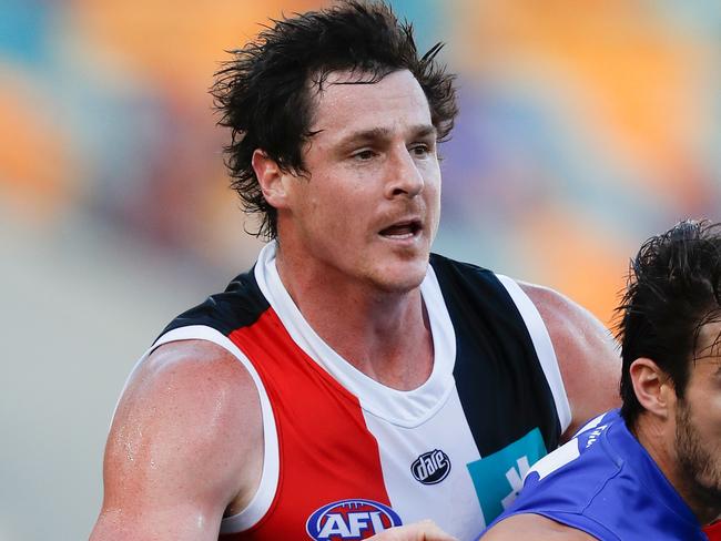 BRISBANE, AUSTRALIA - OCTOBER 03: Jake Carlisle of the Saints and Easton Wood of the Bulldogs in action during the 2020 AFL Second Elimination Final match between the St Kilda Saints and the Western Bulldogs at The Gabba on October 03, 2020 in Brisbane, Australia. (Photo by Michael Willson/AFL Photos via Getty Images)