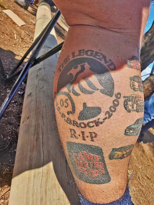 A tribute to race legend Peter Brock on the calf of one Holden fan. Picture: Matthew Dunn