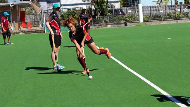 Mackay Hockey coach Melissa Sorensen watches Maleah George in action at the Indigenous Camp at the weekend. Picture: Antoinette Morton