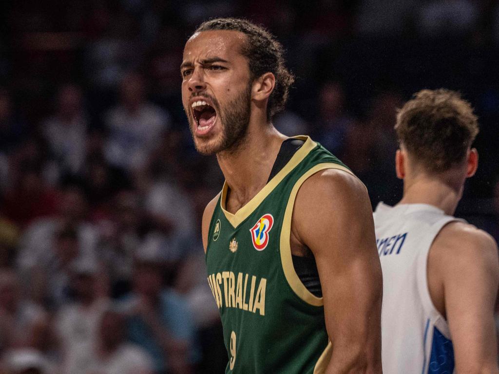 A fired up Xavier Cooks helped the Aussies deliver the knock out. Picture: AFP