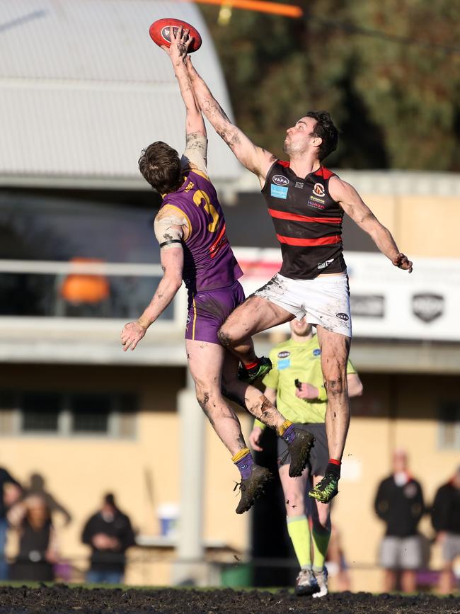 Xavier Richards, right, in action for Old Xaverians this year. Picture: Stuart Milligan