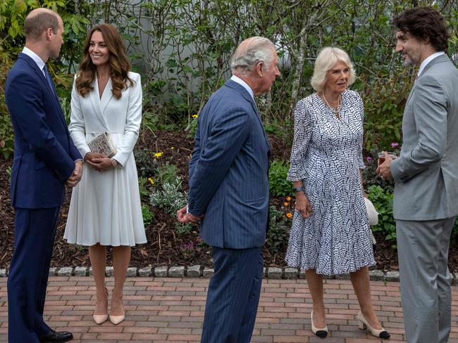 Prince William and Catherine, Prince Charles and Camilla, speak to Canada's Prime Minister Justin Trudeau in Cornwall. Picture: AFP.