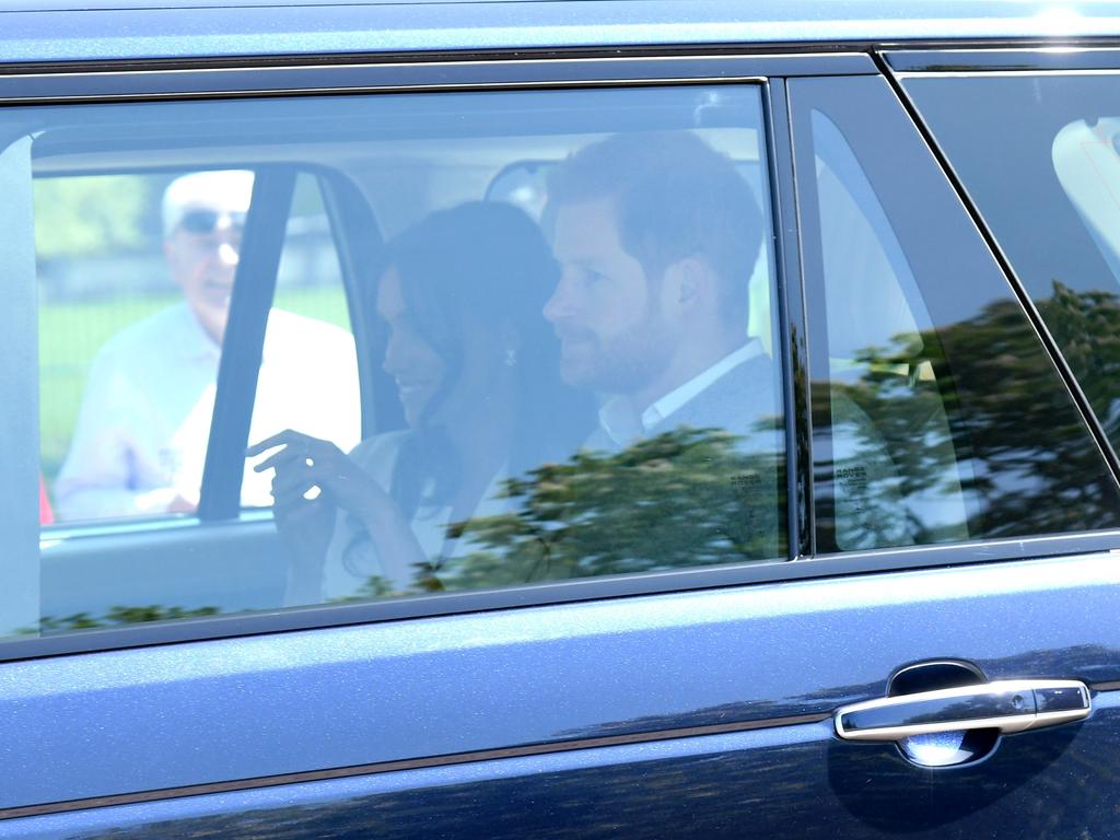 Prince Harry and Meghan Markle arrive for wedding rehearsals ahead of their wedding on Saturday on May 17 in Windsor, England. Picture: Karwai Tang/WireImage