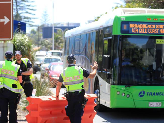 22nd December 2020, Griffith Street Coolangatta, Gold Coast . Queensland Police stop and check buses trying to enter Queensland from NSW through Tweed Heads after QLD closed its borders to Sydney Residents due to other major Covid breakout.Photo: Scott Powick Newscorp