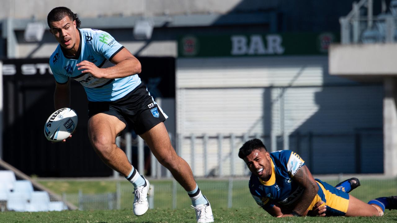 Cronulla escapes Parramatta’s defence. Picture: Monique Harmer