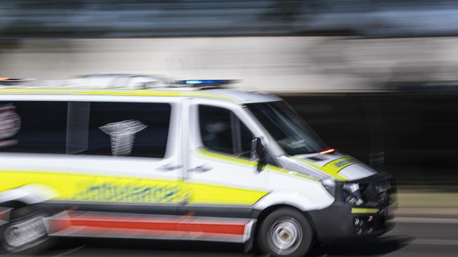 Queensland Ambulance services called after woman suffers abdominal injury following nail gun incident. Picture: Kevin Farmer