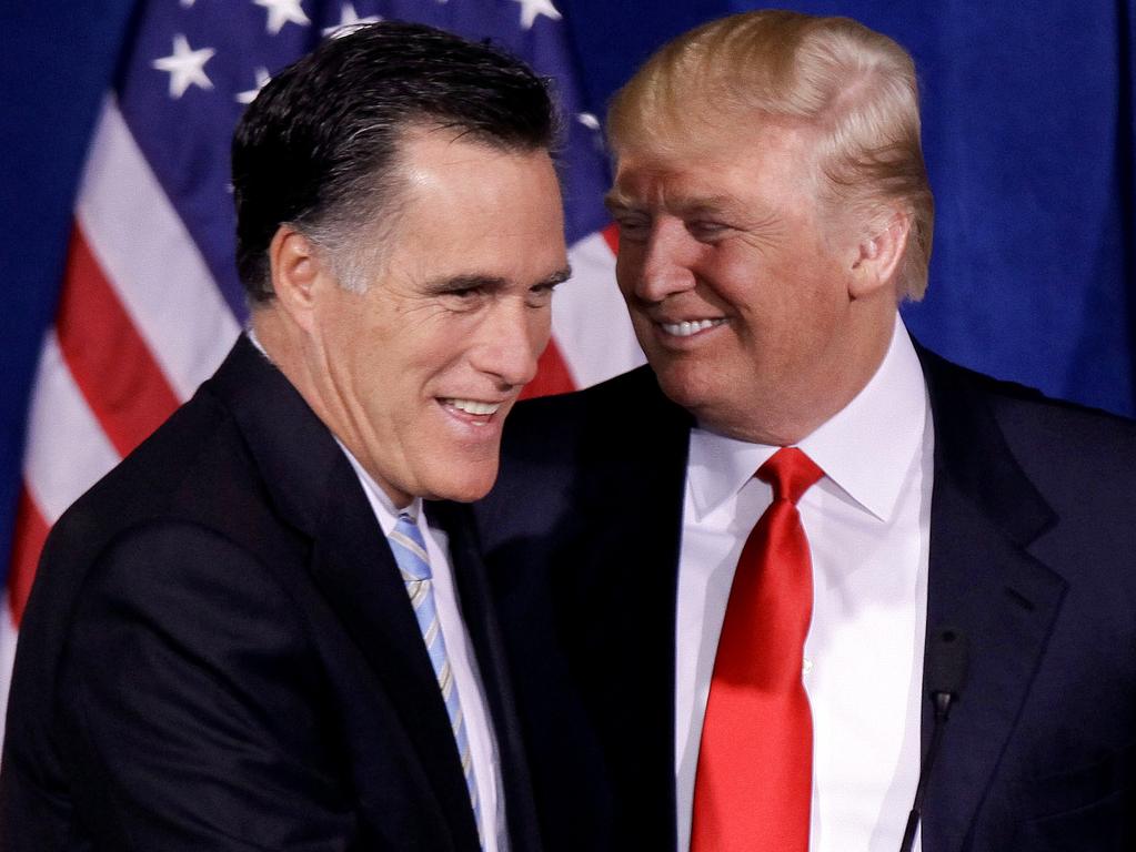 Donald Trump and Mitt Romney in happier times in 2012. Picture: AP