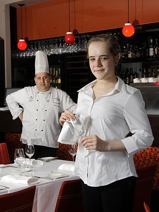 India Bennett with Camillo Crugnale, the owner of Assaggio Ristorante at Hyde Park, Adelaide, which is closing for the public holidays. Picture: Noelle Bobrige