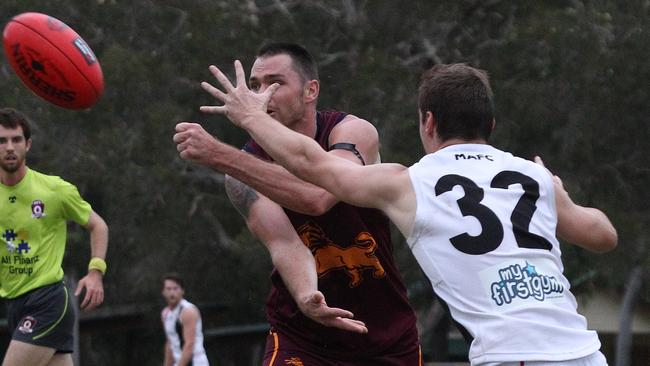 Nathan Colenso, right, playing for Morningside in the QAFL. .Pic Mike Batterham