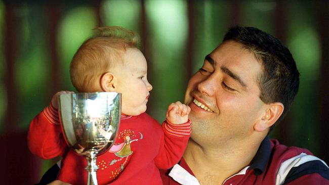 Glenn Panoho in 2000 with the Templeton Cup and daughter Emogen