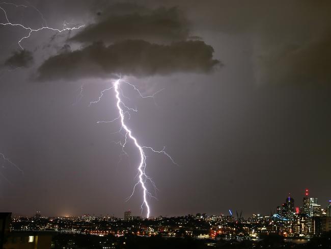 Summer Storms and lightning over Brisbane City from Hamilton, on Sunday October 29th, 2017. AAP Image/Steve Pohlner