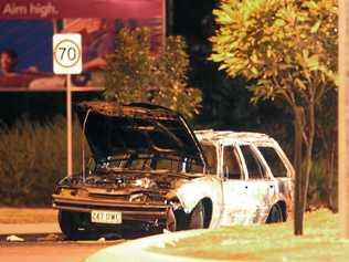 An image of the burnt out car on Springfield Parkway taken on June 10, 2004. Picture: QT File