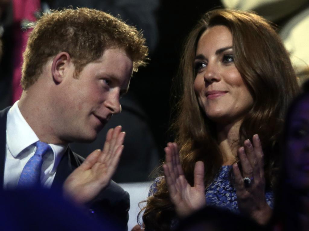 Harry whispers to Kate at the Closing Ceremony of the 2012 Olympics. Picture: Charlie Riedel/AFP