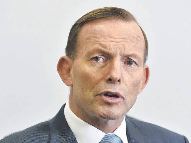 Australian Prime Minister Tony Abbott visits dental technology manufacturer SDI LTD at Bayswater Victoria, Friday 4th December 2104. Picture:Andrew Batsch