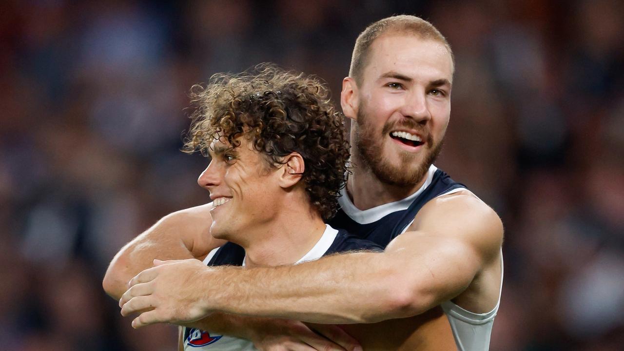 Charlie Curnow of the Blues celebrates a goal with teammate Harry McKay. Picture: Dylan Burns/AFL Photos via Getty Images