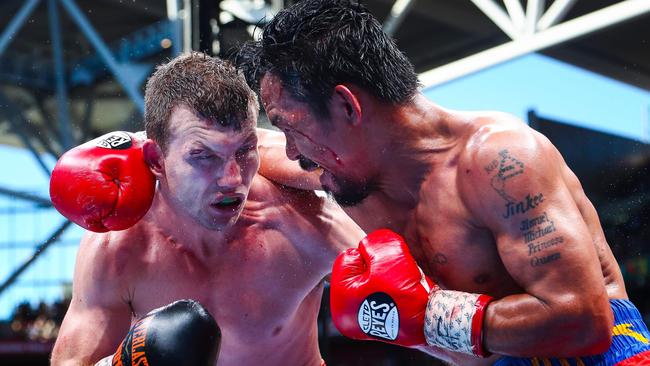 Manny Pacquiao and Jeff Horn famously slug it out at Suncorp Stadium in 2017. Picture: AFP