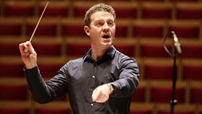 Conductor Brett Weymark in rehearsal for Benjamin Britten's Saint Nicholas.