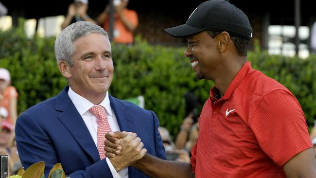 Monahan with Tiger Woods. Photo by Stan Badz/PGA TOUR