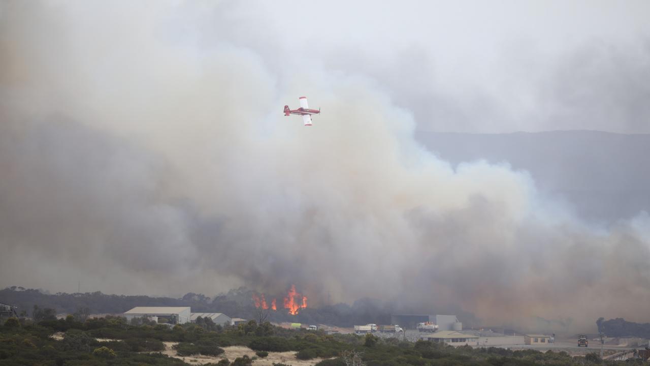 A water bomber in action at Port Lincoln on Monday. Picture: Robert Lang