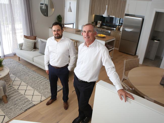 Mr Massoud and Mr Edgar show the interior of a terrace home. Picture: Robert Pozo