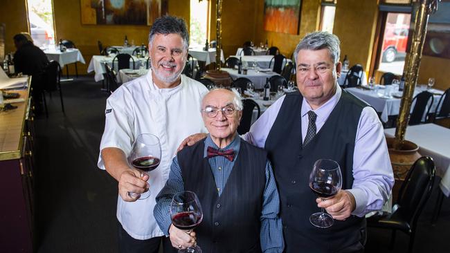 SA restaurant Cork and Cleaver owner Stratos Pouras (centre) with his head chef Greg Favretto and manager Jim Boutsis. Cork and Cleaver closed its doors for the final time after almost 44 years in December 2021. Picture Mark Brake