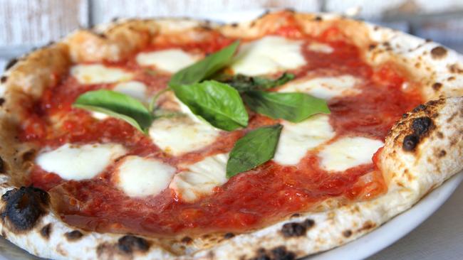 Pizza Riccardo’s sourdough margarita pizza. Picture: Martin Lange