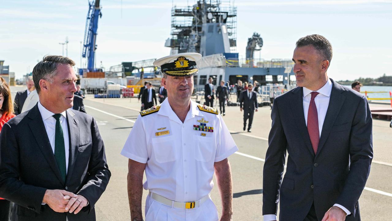 Defence Minister Richard Marles, left, Vice-Admiral Jonathan Mead and Premier Peter Malinauskas at Osborne Naval Shipyard. Picture: NCA NewsWire / Brenton Edwards