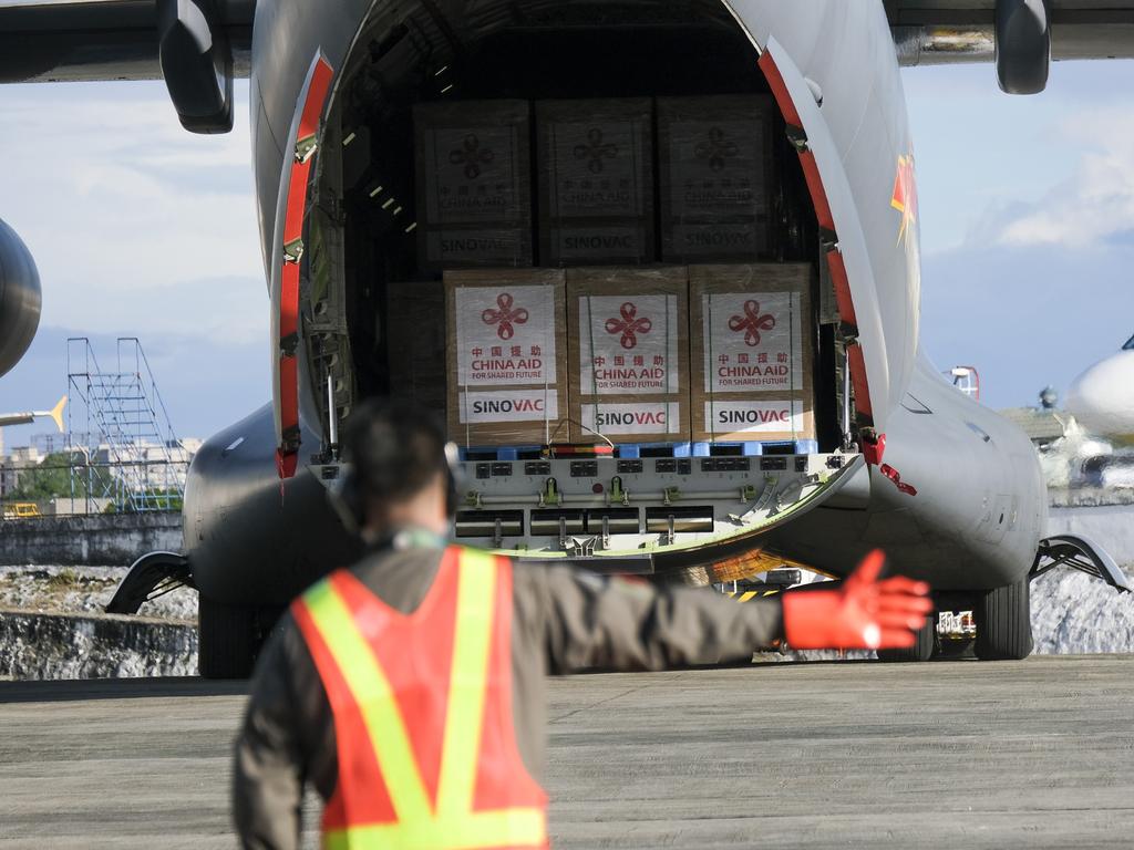 Containers of the Sinovac vaccine arrive on a Chinese military aircraft during a ceremony at Vilamor Airbase in Pasay City, Manila, the Philippines, in February. Picture: Veejay Villafranca/Bloomberg via Getty Images