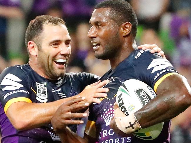 Suliasi Vunivalu is congratulated by Cameron Smith after scoring a try against Leeds Rhinos.