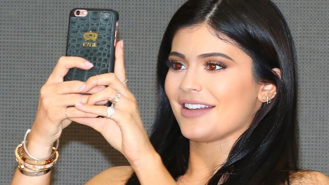 Just in case she forgets her name, Kylie Jenner has it on her phone case (complete with a crown motif). Picture: Scott Barbour/Getty Images