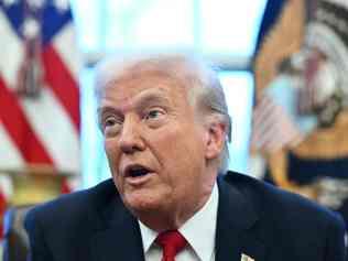 US President Donald Trump announces tariffs on auto imports in the Oval Office of the White House in Washington, DC, on March 26, 2025. Trump announced imposition of 25 percent tariffs on all cars and light trucks not built on US soil. 