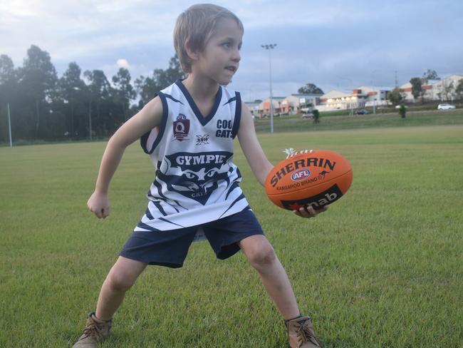 Gympie Cats junior Mitch Penn has been practicing every Thursday in the backyard with his Dad while there was no footy. PHOTO: Bec Singh