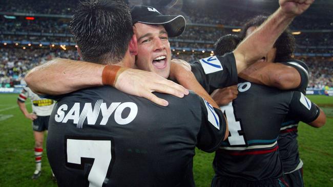 Ryan Girdler and Craig Gower celebrate Penrith’s grand final victory. Pic Gregg Porteous