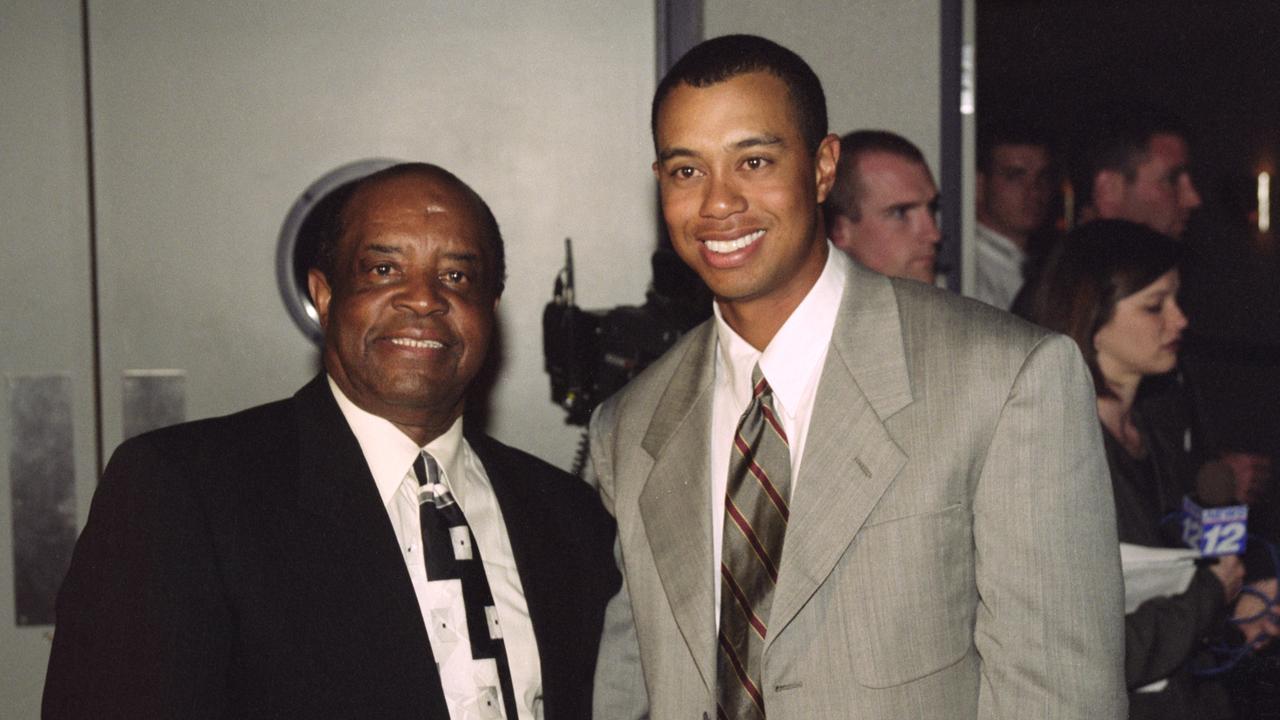 Apr 2000: Lee Elder (left), the last black player to win the US Masters poses with Tiger Woods of USA during the 2000 Masters tournament at the Augusta National Golf Club in Augusta, Georgia, USA. Mandatory credit: David Cannon/Allsport.