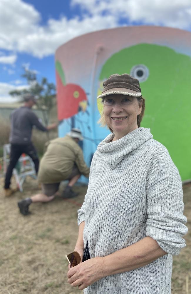 Artist Barbara Joyce oversees the painting of a mural at Flowerdale as part of the Dindi Arts Trail. Picture: Kirra Grimes