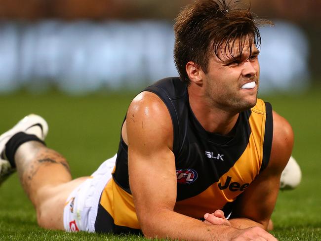 PERTH, AUSTRALIA - APRIL 15: Ben Lennon of the Tigers looks on after marking contest against Brad Sheppard of the Eagles during the round four AFL match between the West Coast Eagles and the Richmond Tigers at Domain Stadium on April 15, 2016 in Perth, Australia. (Photo by Paul Kane/Getty Images)