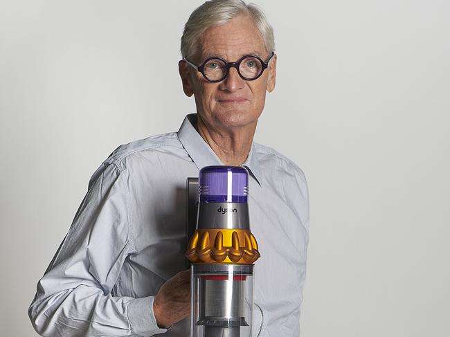 Sir James Dyson with his invention