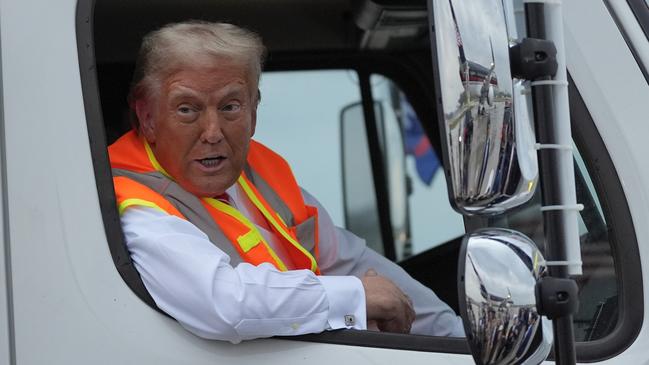 Donald Trump turned up to a rally in a garbage truck to highlight how Joe Biden called his supporters ‘garbage’. Picture: Julia Demaree Nikhinson