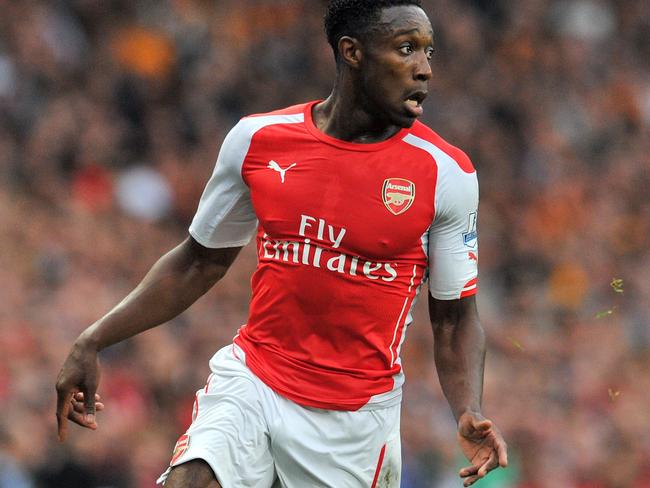 Arsenal's English striker Danny Welbeck runs with the ball during the English Premier League football match between Arsenal and Hull City at the Emirates Stadium in London on October 18, 2014. The game ended 2-2. AFP PHOTO/GLYN KIRK RESTRICTED TO EDITORIAL USE. NO USE WITH UNAUTHORIZED AUDIO, VIDEO, DATA, FIXTURE LISTS, CLUB/LEAGUE LOGOS OR “LIVE” SERVICES. ONLINE IN-MATCH USE LIMITED TO 45 IMAGES, NO VIDEO EMULATION. NO USE IN BETTING, GAMES OR SINGLE CLUB/LEAGUE/PLAYER PUBLICATIONS.