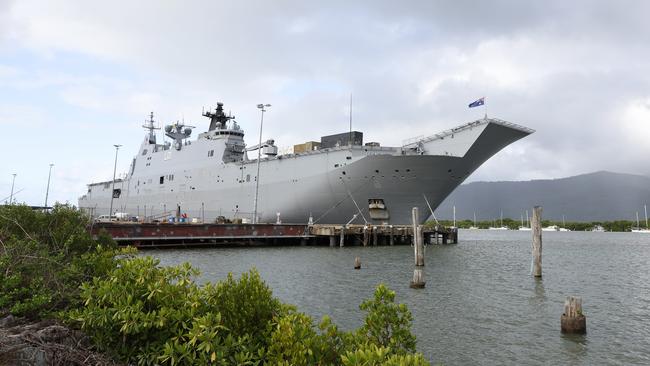 The HMAS Adelaide, a Royal Australian Navy Canberra-class landing helicopter dock ship, moored at the Cairns Wharf. Picture: Brendan Radke