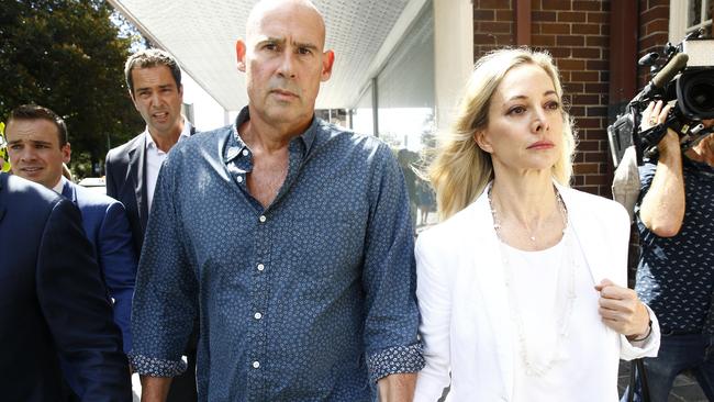 The parents of swim coach Kyle Daniels leave Manly Court after their son was granted Bail.  Picture: John Appleyard