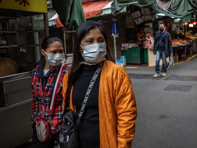 MACAU, CHINA - JANUARY 28: Residents wearing face masks shop at a market on January 28, 2020 in Macau, China. The number of cases of a deadly new coronavirus rose to over 4000 in mainland China Tuesday as health officials locked down the city of Wuhan last week in an effort to contain the spread of the pneumonia-like disease which medicals experts have confirmed can be passed from human to human. In an unprecedented move, Chinese authorities put travel restrictions on the city which is the epicentre of the virus and neighbouring municipalities affecting tens of millions of people.  At least six people have reportedly contracted the virus in Macau. The number of those who have died from the virus in China climbed to over 100 on Tuesday and cases have been reported in other countries including the United States, Canada, Australia, France, Thailand, Japan, Taiwan and South Korea.  (Photo by Anthony Kwan/Getty Images)