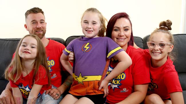 Indyana Wedderburn, 9, with sisters Pypah-Joy, 4, Kylah, 11, and parents Ryan and Megan. Picture: Toby Zerna