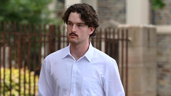 ADELAIDE, AUSTRALIA - NewsWire Photos December 5, 2023: Jake Stock (white shirt)  appeared at Adelaide Magistrates Court for a charge determination. He is charged with dangerous driving causing death. Picture: NCA NewsWire (no by-line thanks)