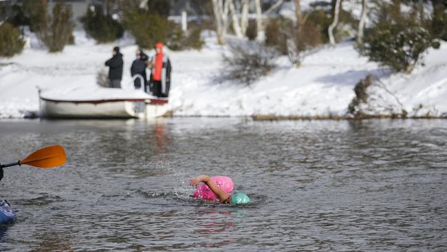 Katya Noble attempts an 'ice mile' at Crackenback Lake in the Snowy Mountains of NSW. Picture: Sean Davey.