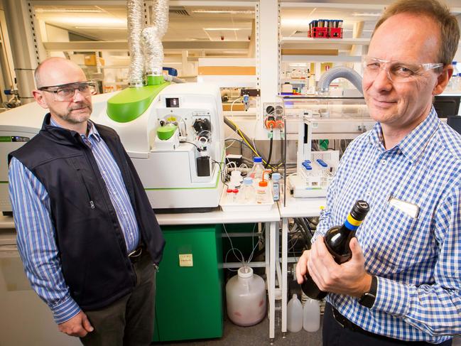 New techniques to catch growing problem of wine fraud. Researchers Martin Day (left) and Eric Wilkes (right) from the Australian Wine Research Institute are working on ways to identify the exact area a wine came from.