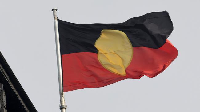 The Aboriginal flag flying on the Sydney Harbour Bridge during NAIDOC week in 2021. Picture: Damian Shaw