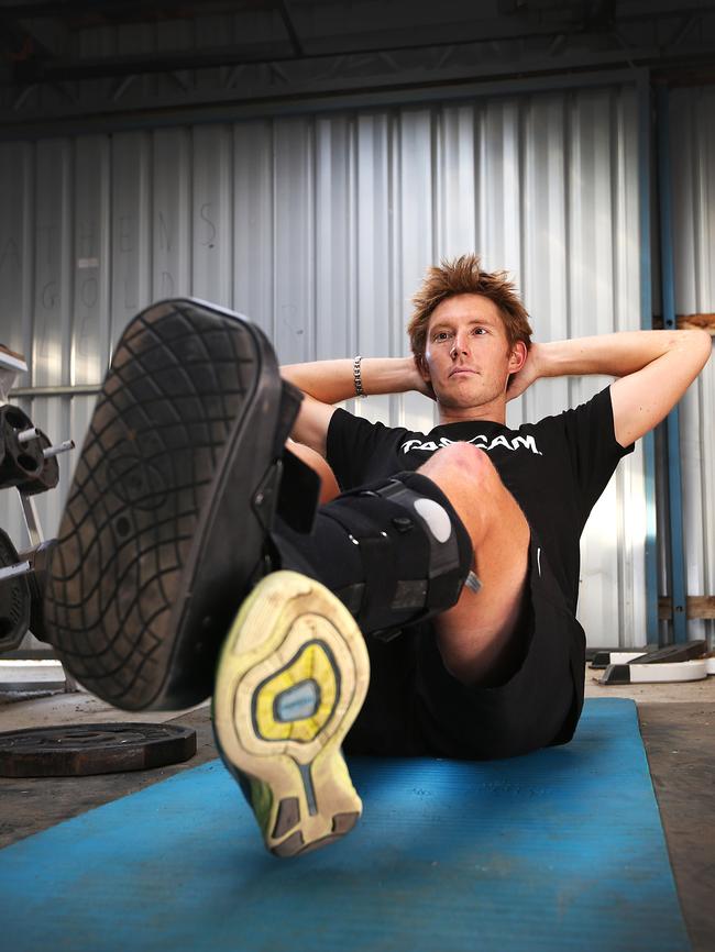 Cameron Wurf - who is back in Tasmania for a few weeks after breaking his foot - is continuing to train as he prepares for the Kona Ironman next month.