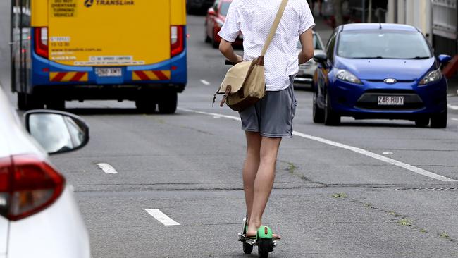 Police have expressed concern about a Facebook event that has encouraged people to ride Lime scooters at high speed across Brisbane. Picture AAP/David Clark